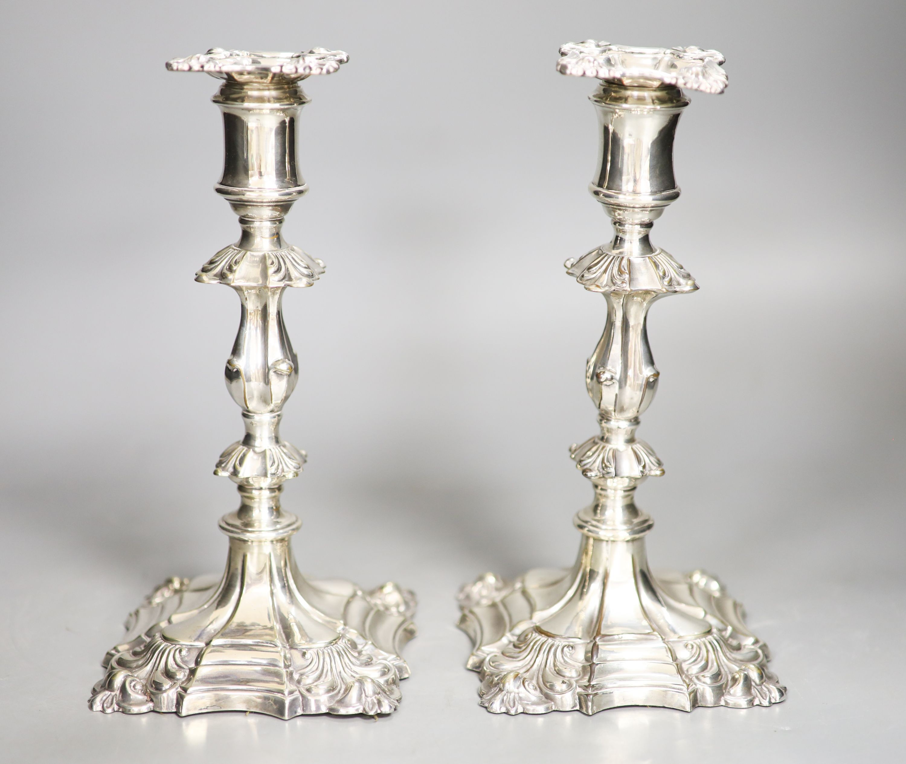 A pair of Victorian silver plated candlesticks 22cm